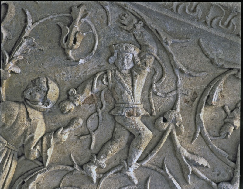 Stairway of the Senior Schools of the University of Salamanca. Detail of the relief of a dancer f?