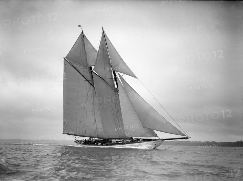 The 250 ton schooner 'Germania' sails close-hauled, 1911. Creator: Kirk & Sons of Cowes.