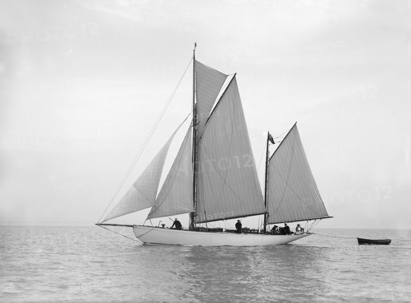 The yawl 'Meander' sailing in close-hauled, 1913. Creator: Kirk & Sons of Cowes.