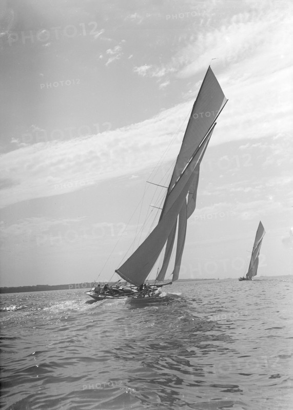 The towering sails of the 15 Metre yacht 'Istria' sailing close-hauled, 1911.  Creator: Kirk & Sons of Cowes.