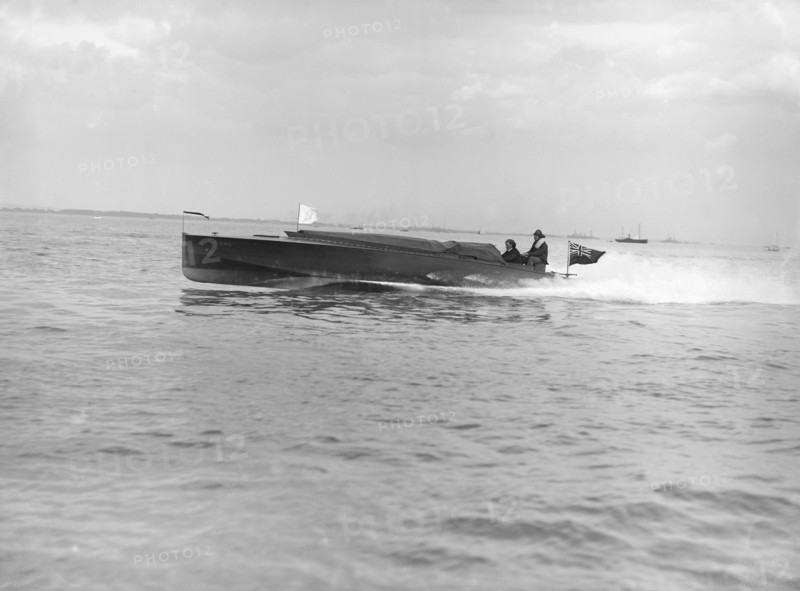 The hydroplane 'Izme' under way, 1913. Creator: Kirk & Sons of Cowes.