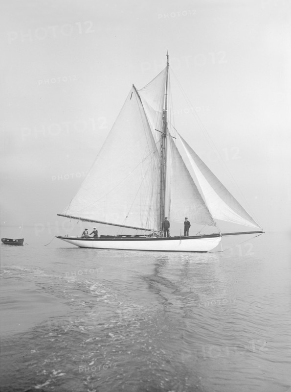 The cutter 'Wenda' in light winds, 1912. Creator: Kirk & Sons of Cowes.