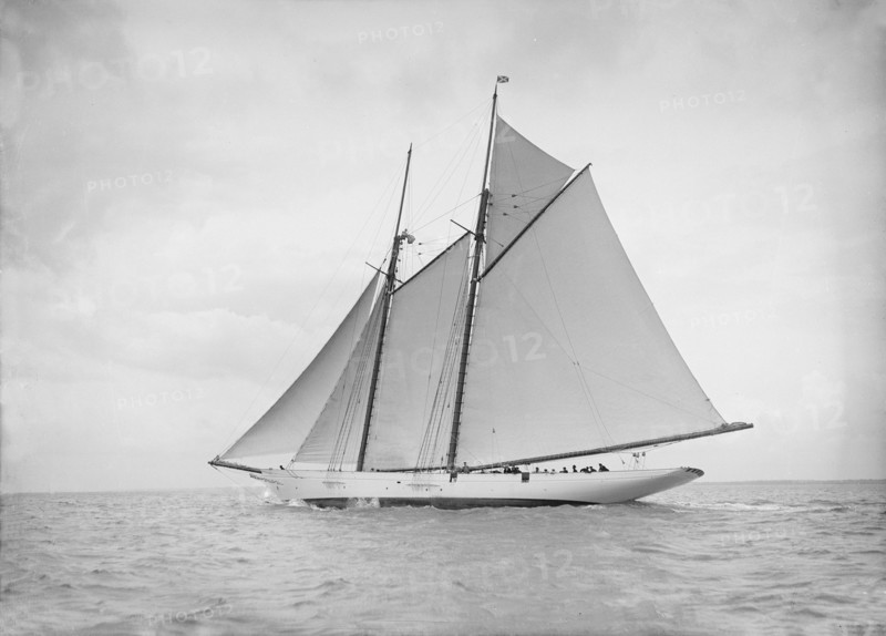 The schooner 'Cetonia' under way, 1911. Creator: Kirk & Sons of Cowes.