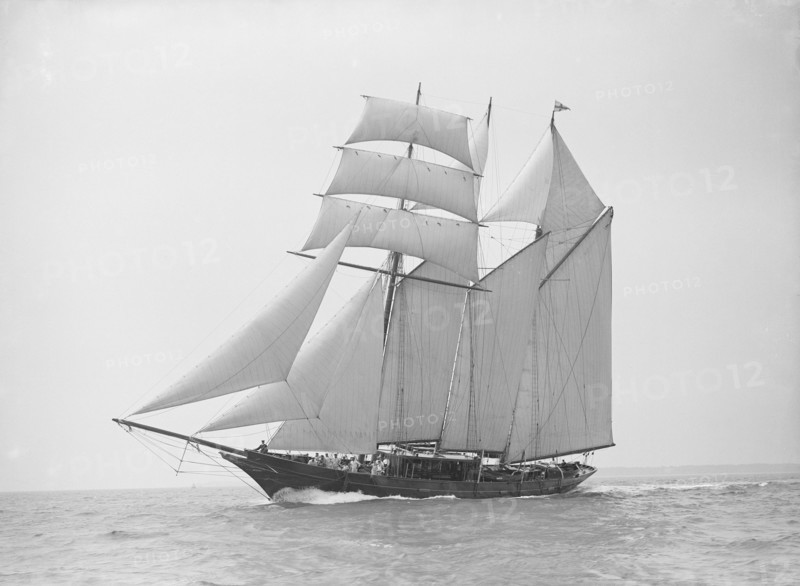 The auxiliary schooner 'La Cigale' sailing close-hauled, 1913. Creator: Kirk & Sons of Cowes.