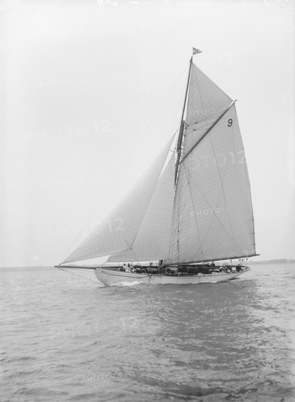 The cutter 'Westwind' sailing close-hauled, 1912. Creator: Kirk & Sons of Cowes.