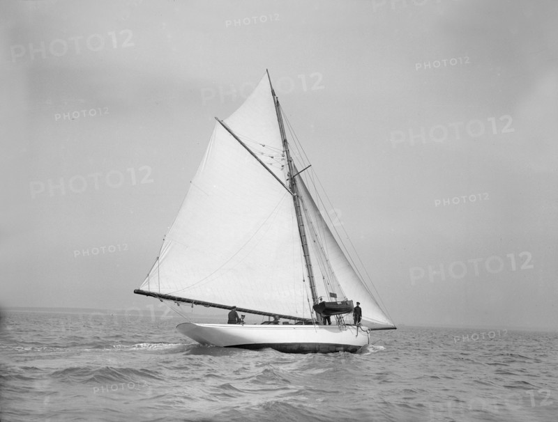 The cutter 'Grisette' sailing close-hauled, 1913. Creator: Kirk & Sons of Cowes.