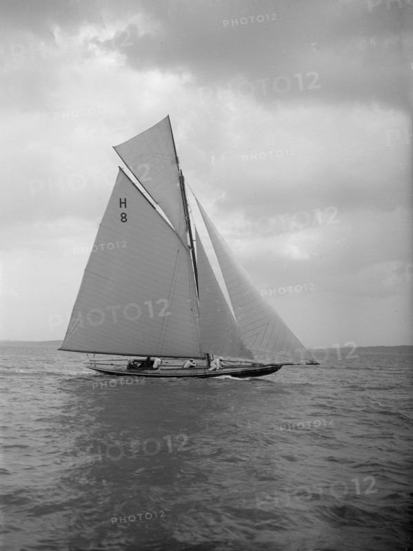The 8 Metre 'Spero' (H8) sailing upwind, 1912. Creator: Kirk & Sons of Cowes.