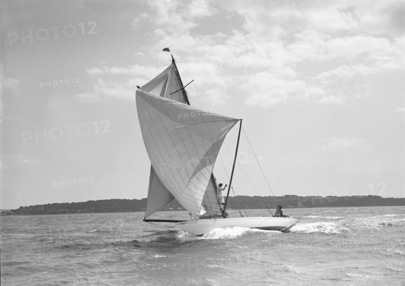 Setting spinnaker on the 8 Metre sailing yacht 'Spero', 1911. Creator: Kirk & Sons of Cowes.