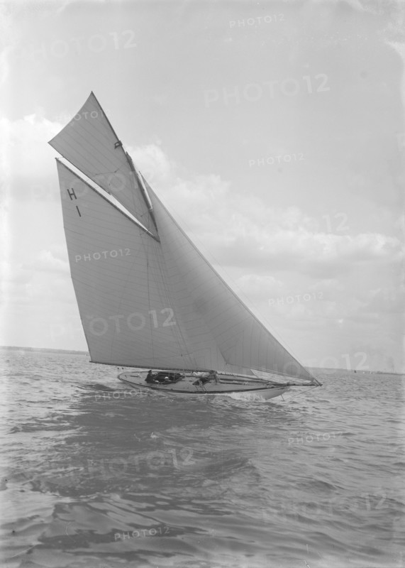The 8 Metre yacht 'Norman' (H1) sailing close-hauled, 1911. Creator: Kirk & Sons of Cowes.