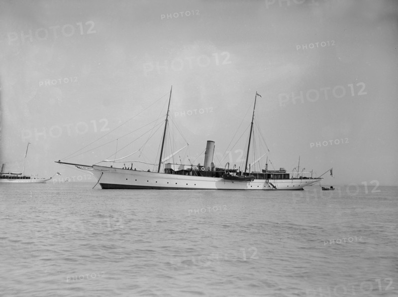 The steam yacht 'Agatha' at anchor, 1911. Creator: Kirk & Sons of Cowes.