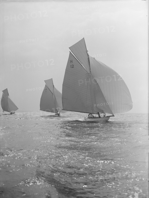 'The Truant' and 'Antwerpia IV' racing with spinnakers, 27th May 1912. Creator: Kirk & Sons of Cowes.