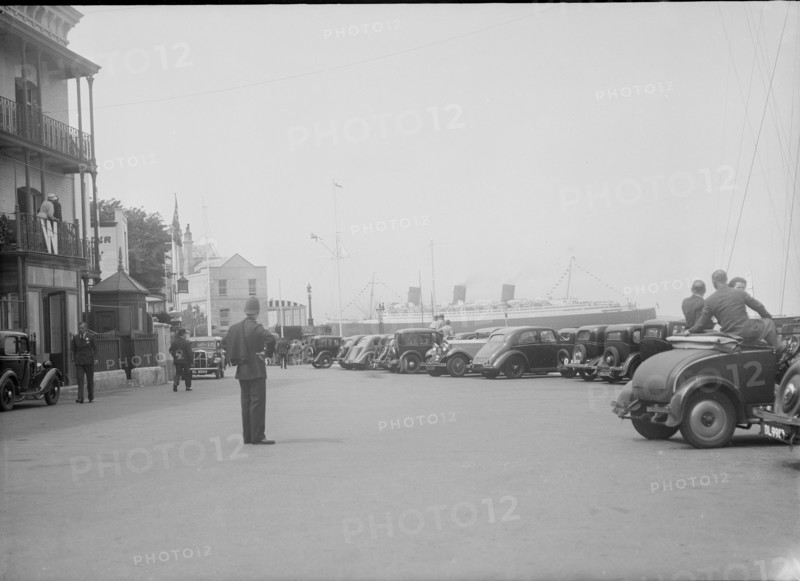 'RMS Queen Mary' passing Cowes, Isle of Wight, August 1936. Creator: Kirk & Sons of Cowes.