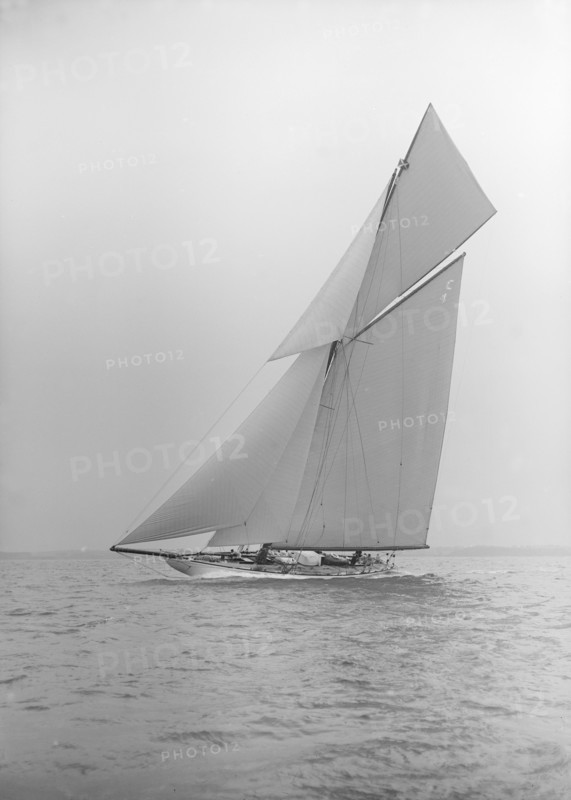 The 19-metre cutter 'Norada' sailing close-hauled, 1913. Creator: Kirk & Sons of Cowes.