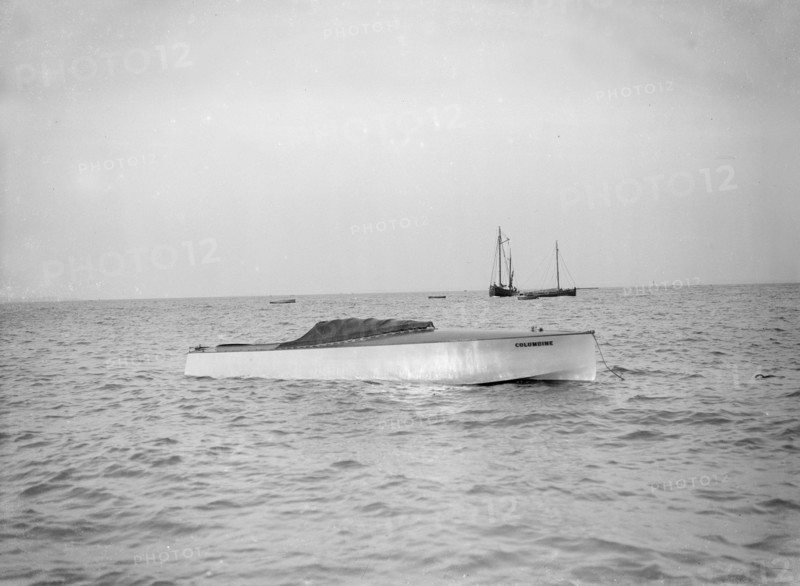 The hydroplane 'Columbine' at anchor. Creator: Kirk & Sons of Cowes.