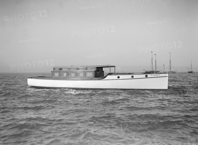 The motor launch 'Cygnet' under way, 1912. Creator: Kirk & Sons of Cowes.