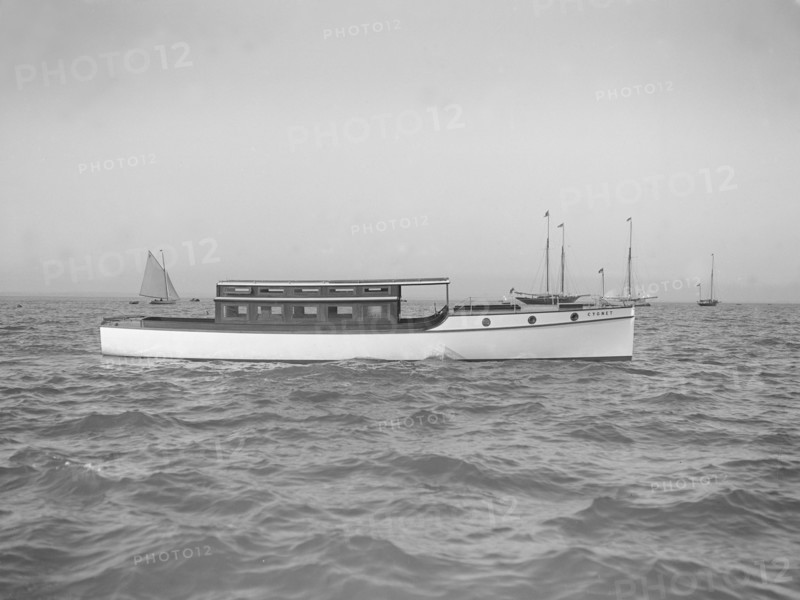 The motor launch 'Cygnet' under way, 1912. Creator: Kirk & Sons of Cowes.