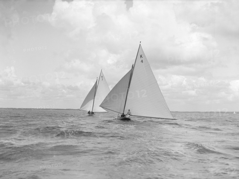 The 7 Metre class 'Anitra' (K4) and 'Ginevra' (K7) race downwind, 1912. Creator: Kirk & Sons of Cowes.