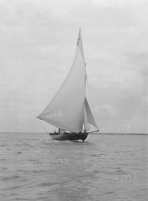 The 32 metre ketch 'Joyette' running downwind, 1922. Creator: Kirk & Sons of Cowes.