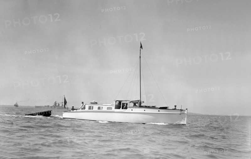 The motor yacht 'Sygnet' under way, 1933. Creator: Kirk & Sons of Cowes.