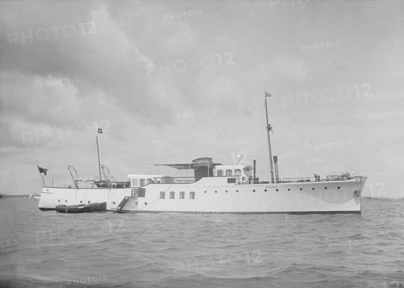 The motor yacht 'Wilma' at anchor, 1936. Creator: Kirk & Sons of Cowes.