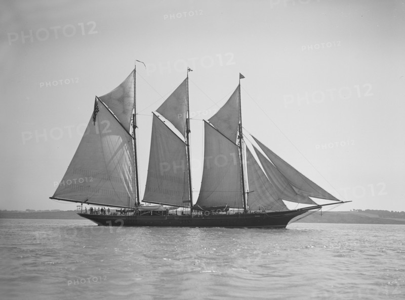 The three-mast auxiliary schooner 'Invincible', 1911. Creator: Kirk & Sons of Cowes.