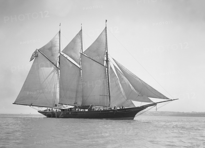 The three-mast auxiliary schooner 'Invincible', 1911. Creator: Kirk & Sons of Cowes.