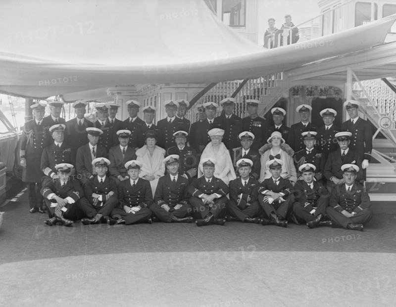 King George V and Queen Mary on board 'HMY Victoria and Albert', 1931. Creator: Kirk & Sons of Cowes.
