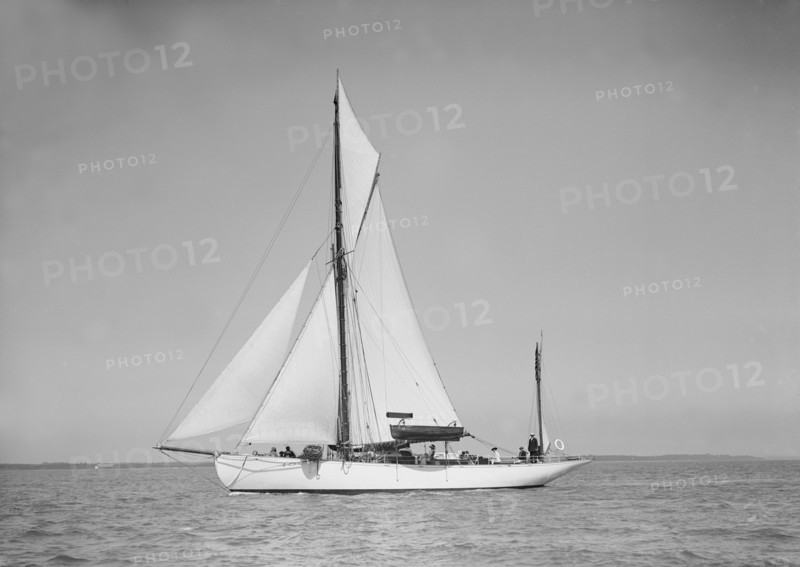The yawl 'Suzanne' under sail, 1911. Creator: Kirk & Sons of Cowes.