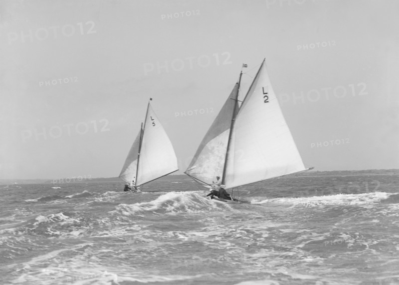 The 6 Metre 'Correnzia' and 'Snowdrop' heading downwind in breezy conditions, 1911. Creator: Kirk & Sons of Cowes.