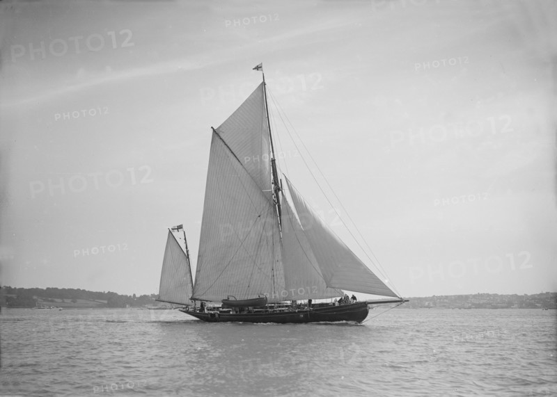 The 95 ft yawl 'Artemis' sailing close-hauled, 1911. Creator: Kirk & Sons of Cowes.