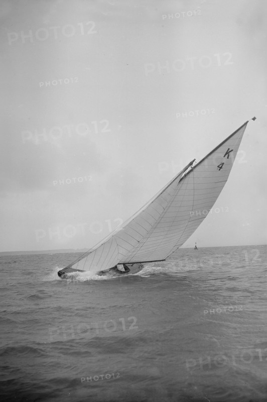 The 7 Metre 'Anitra' (K4) heeling in strong wind, 1912. Creator: Kirk & Sons of Cowes.