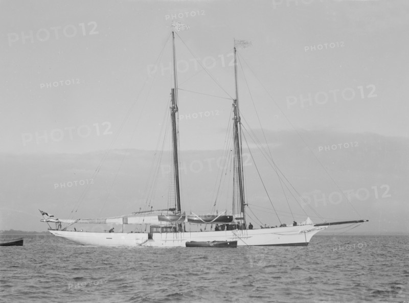 The 161 ton schooner 'Amphitrite' at anchor, 1922. Creator: Kirk & Sons of Cowes.