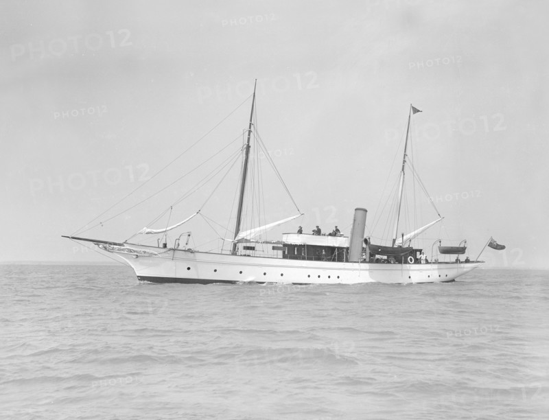 The steam yacht 'Titania' under way, 1911. Creator: Kirk & Sons of Cowes.