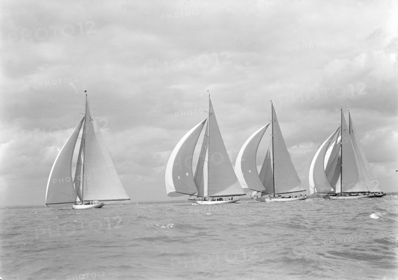 The Big Five J Class yachts racing downwind, 1934. Creator: Kirk & Sons of Cowes.
