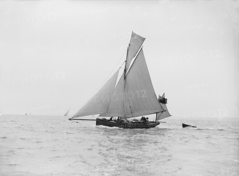 The yawl 'Lola' under sail, 1913. Creator: Kirk & Sons of Cowes.