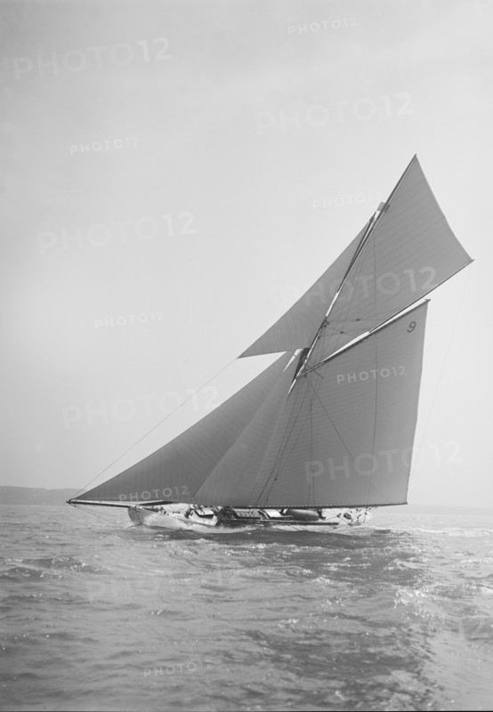 The cutter 'Rosamond' sailing close-hauled, 1911. Creator: Kirk & Sons of Cowes.