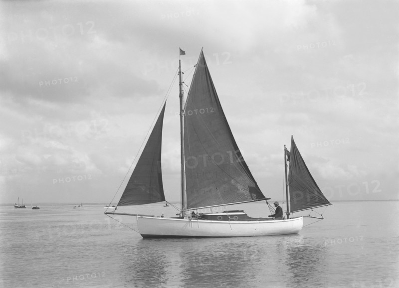 The 4 ton yawl 'Mandy' under sail, 1922. Creator: Kirk & Sons of Cowes.