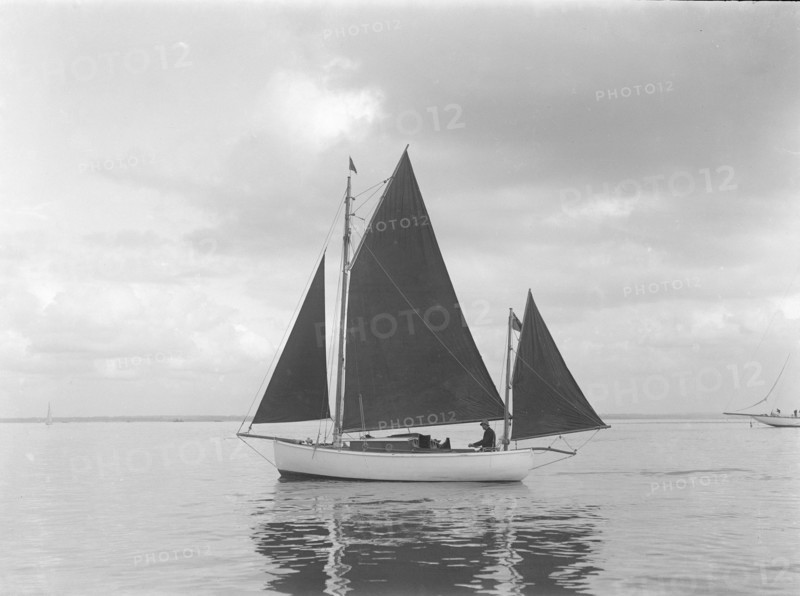 The 4 ton yawl 'Mandy' under sail, 1922. Creator: Kirk & Sons of Cowes.