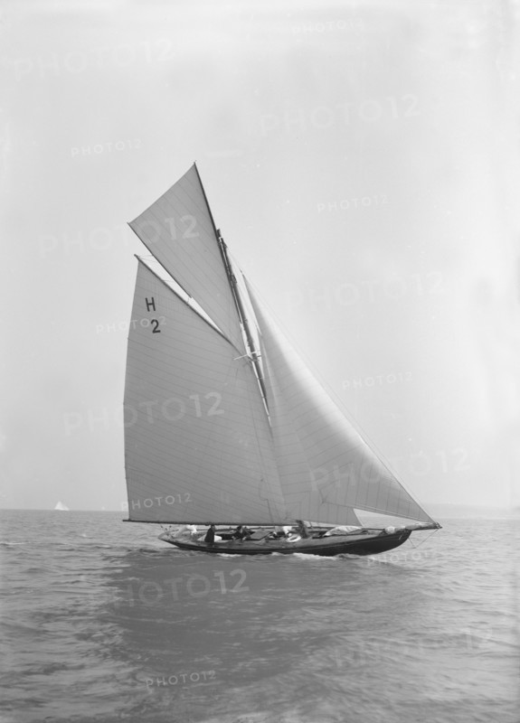 'Verbena' (H2), a gaff rig 8 Metre, sailing close-hauled, 1911. Creator: Kirk & Sons of Cowes.
