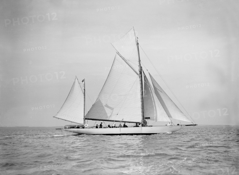 The yawl 'Nevada' under sail, 1911. Creator: Kirk & Sons of Cowes.