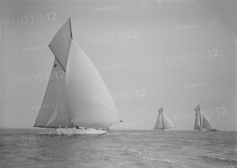 The cutter 'Onda' sailing under spinnaker, 1911. Creator: Kirk & Sons of Cowes.