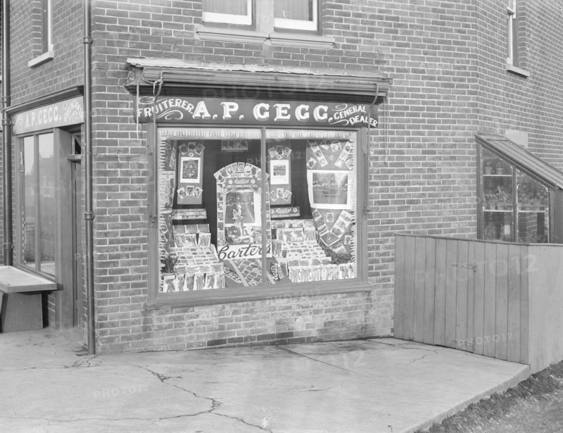 Decorated shop window of AP Gegg, c1935. Creator: Kirk & Sons of Cowes.