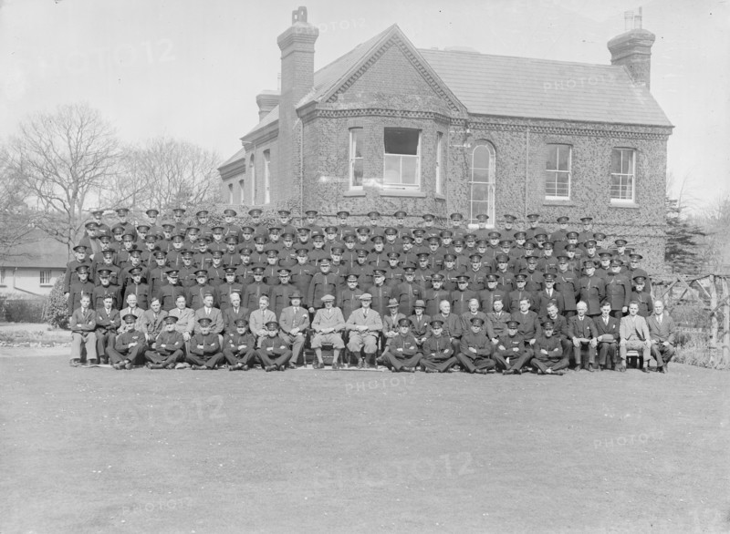 Group portrait of wardens, c1935. Creator: Kirk & Sons of Cowes.