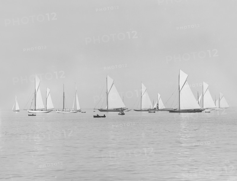 Group of racing yachts before the start of the Cowes to Weymouth Race, 1913. Creator: Kirk & Sons of Cowes.