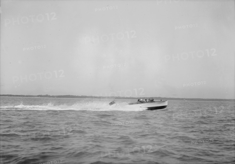 Unknown speedboat underway. Creator: Kirk & Sons of Cowes.