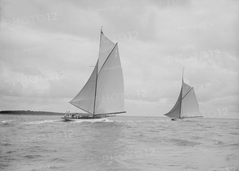The racing cutters 'The Lady Anne' and 'Istria' running downwind, 1912. Creator: Kirk & Sons of Cowes.