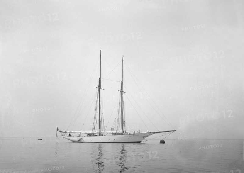 Schooner at anchor. Creator: Kirk & Sons of Cowes.