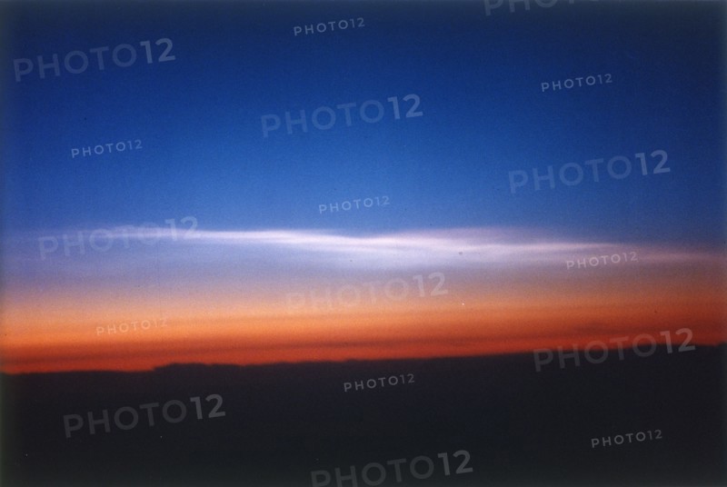 Clouds 39,000 feet north of Stavanger, Norway, seen from DC-8 plane. Creator: NASA.