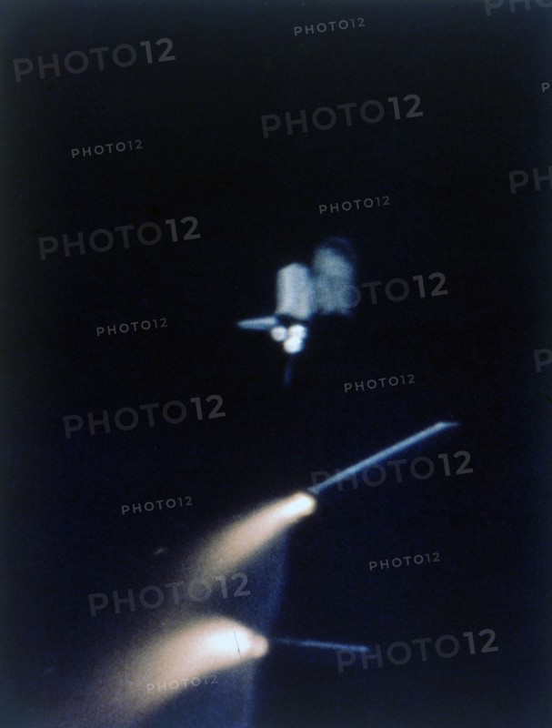 Solid rocket booster separates, first Space Shuttle flight, 12 April 1981. Creator: NASA.