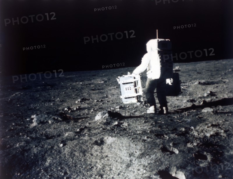 Buzz Aldrin carries out an experiment on the lunar surface, Apollo II mission, July 1969. Creator: Neil Armstrong.